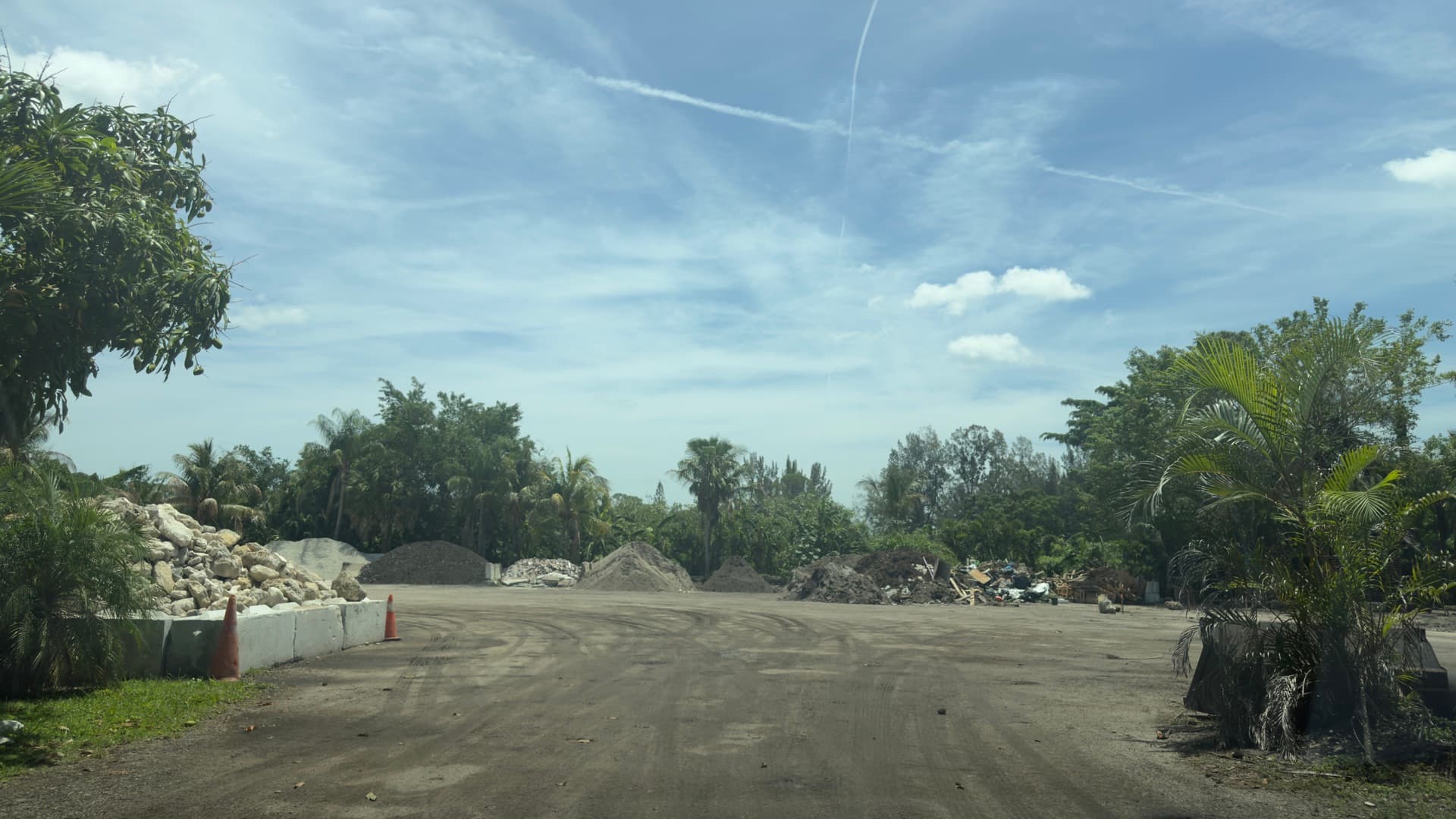 Materials yard overview with multiple aggregate piles